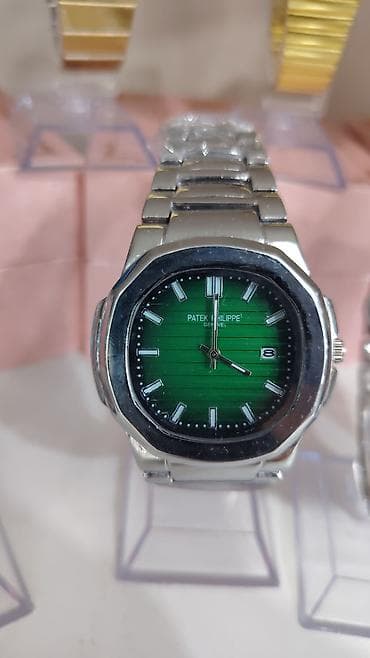 elektrikli saat: Patek Philippe tərzində analoq qol saatları – klassik Nautilus dizaynı — 5