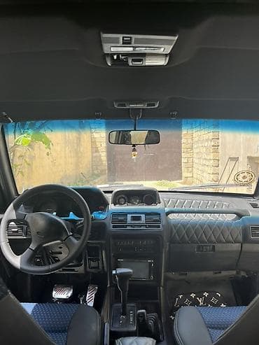arxa panel: Mitsubishi Pajero: 2.8 l | 1995 il Ofrouder/SUV — 6