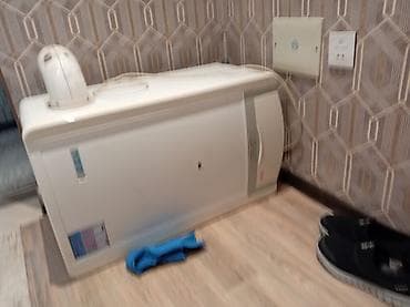 Qazla işləyən məişət konvektor radiator - Divar kənarında