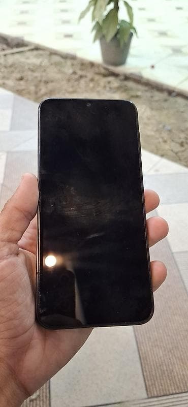 iphone 4 s: Samsung Galaxy A14 — 1