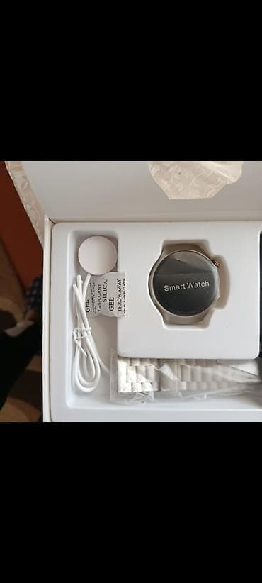 philips xenium 9@9q: Ağıllı saat – dairəvi ekranlı, metal bədənli və metal qolbaqlı model — 1
