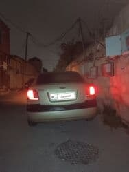 mersedes w210 bufer: Kia Rio: 1.4 l | 2008 il Sedan — 2