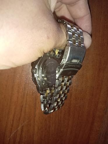 saat original: Kişi qol saatı – metal biləkbağı və təqvim funksiyalı - Korpus — 2