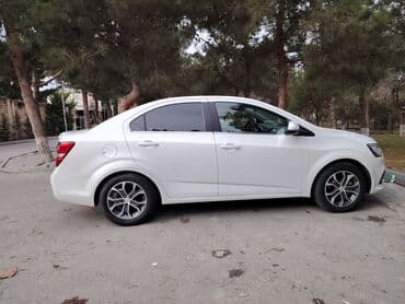 opel astra h 1.3 turbo: Chevrolet Aveo sedan – ağ rəng Model xüsusiyyətləri: - Korpus: 4 — 4