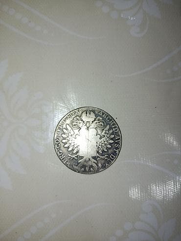 Искусство и коллекционирование: Mariya Tereza Taleri sikkəsi Sikkənin xüsusiyyətləri: **Üz tərəfi — 2