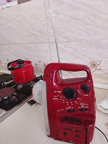 kohnə radio: Portativ radio/fonar/kəmər tipli cihaz - AM/FM radio: TUNING — 1