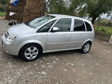 опель зафира а: Opel Meriva, gümüşü rəng, 5 yerlik kompakt MPV. Xarici: - Gümüş — 18
