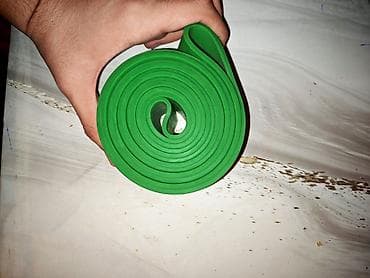 ev turniki: Məhsul: Yaşıl loop tipli rezin güc bantı (power band)Juqut 125 lb — 3