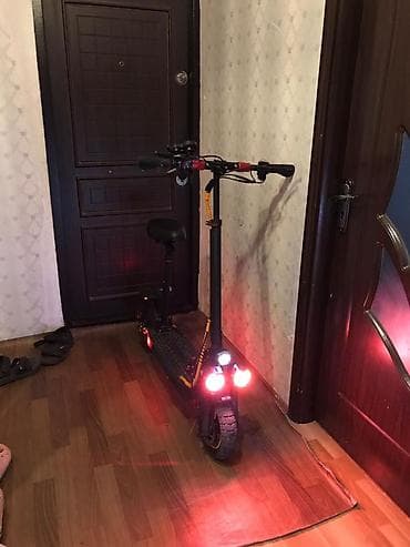 Elektrik skuter – oturacaqlı, güclü işıqlandırma və amortizasiya ilə