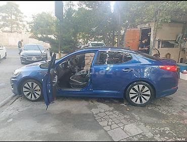 Продажа авто: Kia Optima SX T-GDI, mavi rəngli sedan. Xarici: - Parlaq mavi kuzov — 4