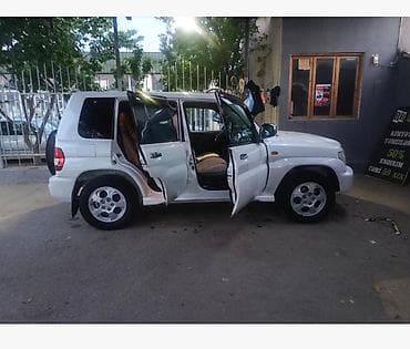 renault megane motoru: Mitsubishi Pajero iO (GDI) – 5 qapılı kompakt off-road SUV. il:2000 — 8