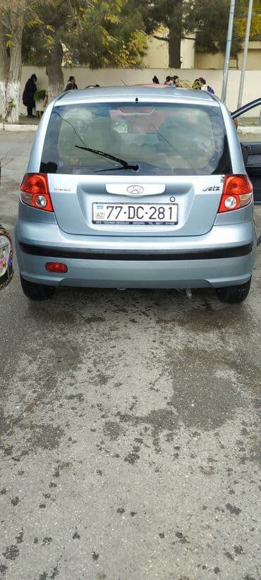 Кулоны и подвески: Hyundai Getz, gümüşü rəng, 5 qapılı hetçbek. Xüsusiyyətlər: - Xarici — 1