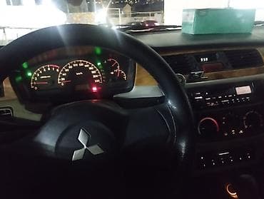 qosqu satisi: Mitsubishi Lancer: 1.6 l | 2007 il 280 km Sedan — 4