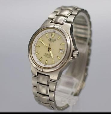 curren saat: Seiko Solar Titan qol saatı - Model və mexanizm: Seiko Solar – günəş — 1
