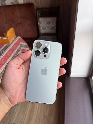 aple 8: IPhone 15 Pro, 128 GB, Natural Titanium, Simsiz şarj, Face ID — 1