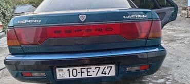 maşın al: Daewoo Espero sedan - Kuzov: sedan, tünd yaşıl rəng - Ön və arxa işıq — 2