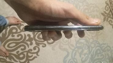 2 ci el tv: IPhone Xs, 64 GB — 6