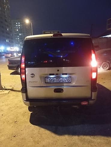 bmw i8 satilir: Fiat Doblo miniven Xüsusiyyətlər: - Gümüş rəngli kuzov, 5 qapı (yan — 3