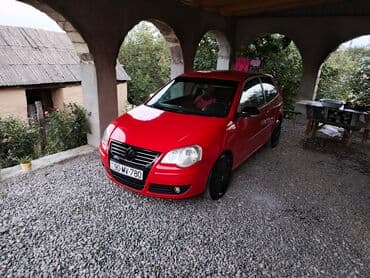 Motonəqliyyat: Volkswagen Polo hatchback, 3 qapılı, parlaq qırmızı rəng. Xarici: - — 1