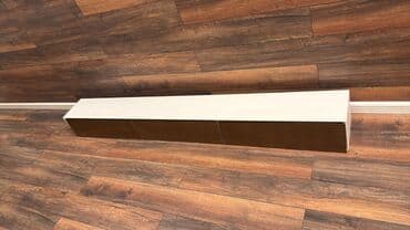 kafel satilir: Ağ rəngdə divar paneli. Tv altliqi satilir istifade olumyub hec yendi — 2