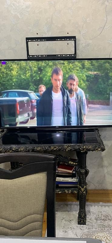 a 32 ekran: LG LED televizor (təxminən 43–50 düym) - Ekran: LED, Full HD/4K — 2