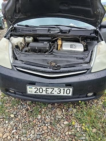 daewoo 2005 model: Toyota Prius – hibrid hetçbek - Rəng: tünd boz (metallik) - Kuzov: 5 — 9