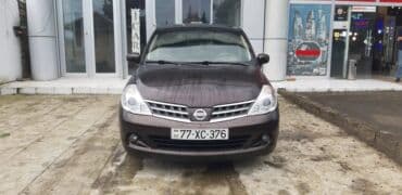 motosiklet telefon tutucu: Nissan Tiida: 1.5 l | 2011 il Hetçbek — 13