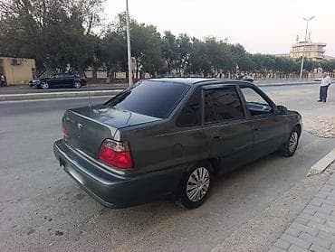 2005 kia sephia: Daewoo Nexia: 1.5 l | 2001 il Sedan — 3