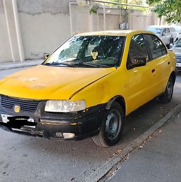 turbo az qaz 21: Model: Iran Khodro Samand (sedan) Kuzov: 4 qapı, sarı/qara rəng sxemi — 4