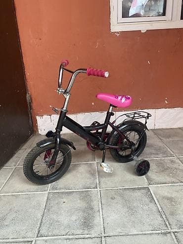 Uşaq velosipedləri – 12" ölçü Təklif olunur: - Çəhrayı dekorlu model — 4