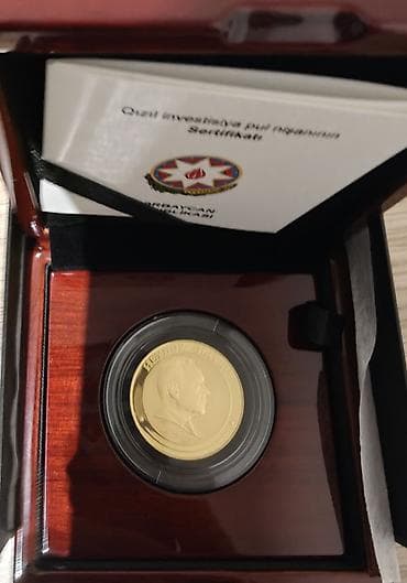 Монеты: Qızıl investisiya sikkəsi – Heydər Əliyev təsvirli.31.1 qram (1 — 1