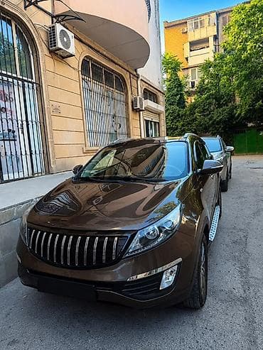 Продажа авто: Kia Sportage SUV - Kuzov rəngi: qəhvəyi, parlaq örtük - Geniş — 1