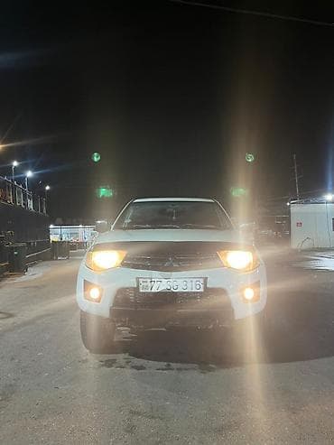 vita avto: Mitsubishi L200: 2.5 l | 2012 il 256000 km Pikap — 1