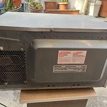 mikrovolnovka: Mikrodalğalı soba Panasonic, Ayrıca dayanan, Mikrodalğalar ilə, rəng - Gümüşü — 1