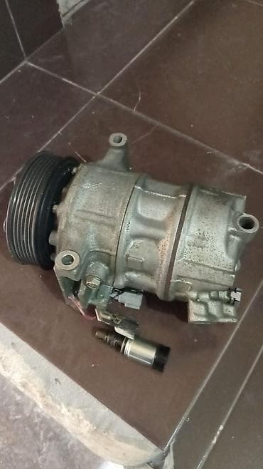 Nissan sentranindi Təsvir: - Kəmər kasnaqlı AC kompressor qurğusu -