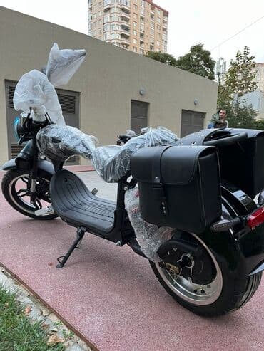 mopedlər tufan: Şəhər içi rahat və stilsiz gediş üçün elektrik kruizer. Plug-in şarj — 2