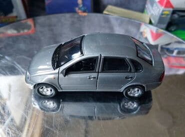metbex tavan modelleri: Коллекционная модель Lada Kalina VAZ1118 silver 2004 Welly Scale — 13