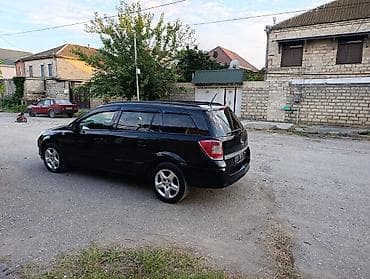 bmw e60 disk: Opel Astra: 1.4 l | 2007 il 286900 km Universal — 4