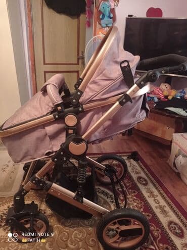 купить детские коляски: Bu uşaq arabası rahat və praktikdir. Qızılgül rəngindədir və müasir — 3