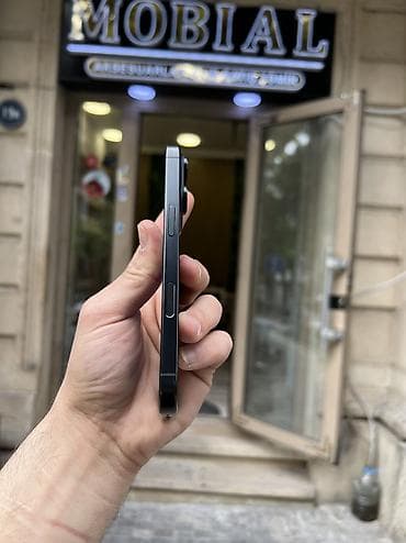 buoy iphone satın: IPhone 16 Pro, 128 GB, Black Titanium, Zəmanət, Simsiz şarj, Face ID — 2