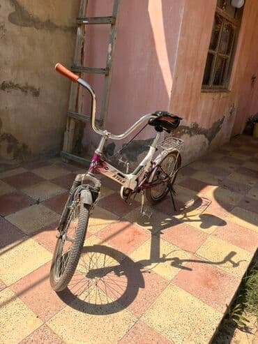 aurus велосипед: Stels markalı bu qatlanan velosiped ağ və bənövşəyi rəngdədir. Kiçik — 3