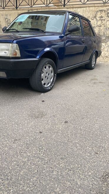 tofaş satış: Model: Tofas Şahin (sedan) Kuzov: 4 qapı, mavi rəng Yanacaq: Benzin — 5