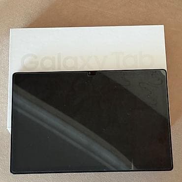samsung 980: Samsung Galaxy Tab A8 planşeti. Şəkillərdə qutu üzərində model və — 2