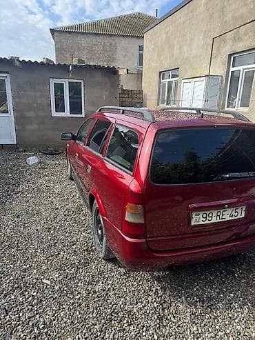 Opel: Opel Astra Caravan (Universal), qırmızı gövdə yalnız kredetlə — 8