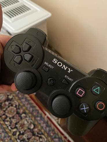 ps3 qiymeti kontakt home: Sony PlayStation 3 (PS3) Slim oyun konsolu + orijinal simsiz DualShock — 2