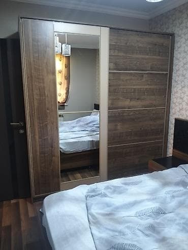 İkinəfərlik çarpayı