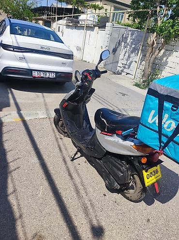 Mopedlər,skuterlər: 125 cc — 4
