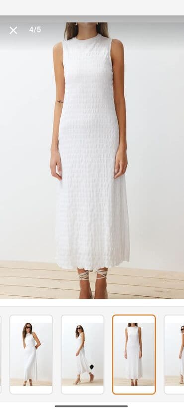 qadın ucun donlar: Ağ rəngli, midi uzunluqda, qolsuz qadın paltarı. Düz siluetli model — 1