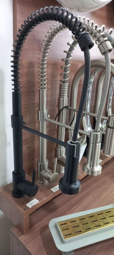 смеситель для кухни: Müasir dizayna malik bu mətbəx kranı qara rəngdədir və paslanmayan — 1