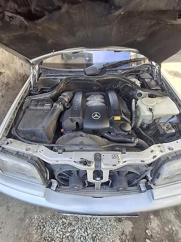 06 maşını: Mercedes-Benz 240: 2.4 l | 1997 il Sedan — 10